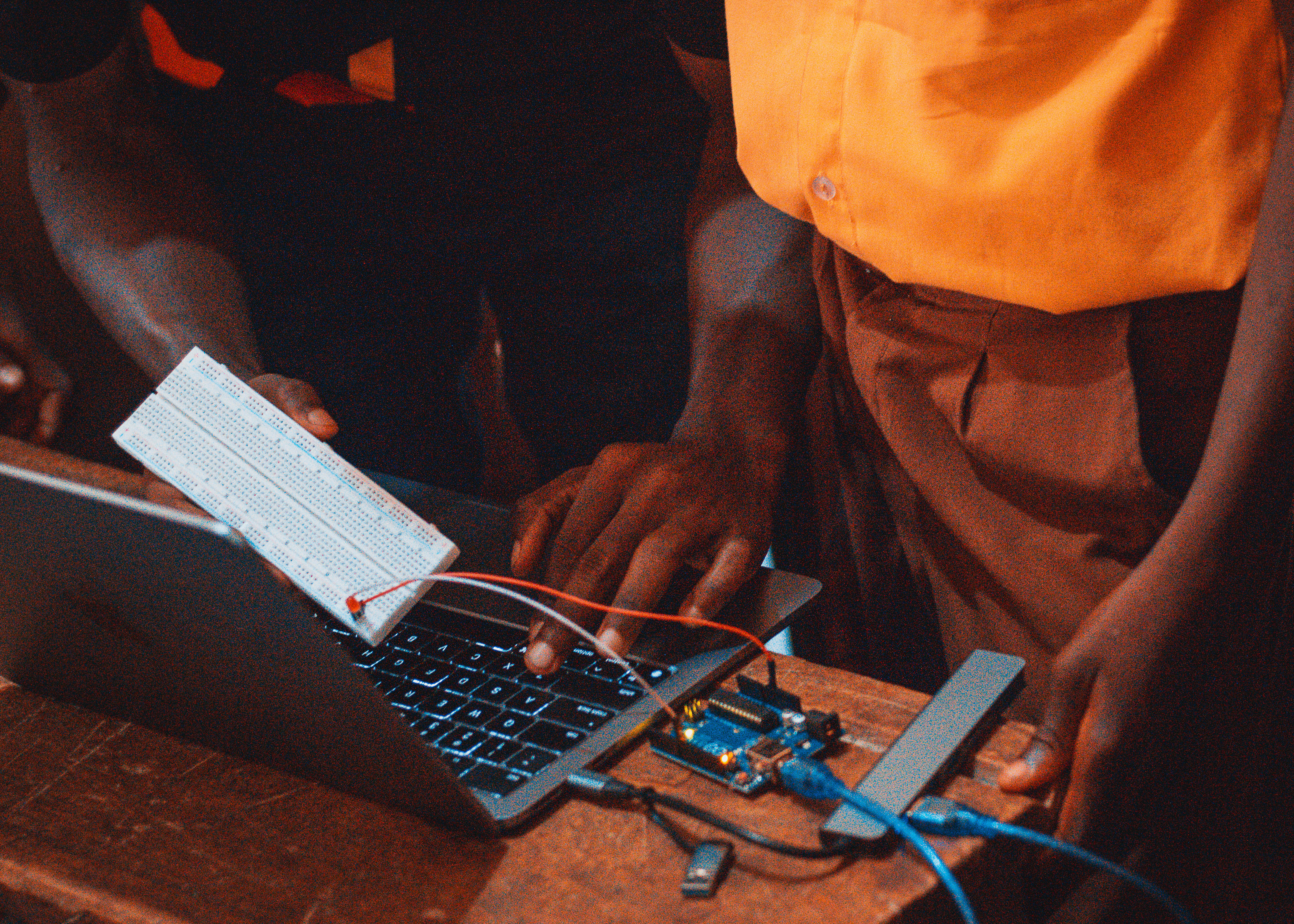 Students participating in an Arduino activity at Anyanui E.P. Basic School