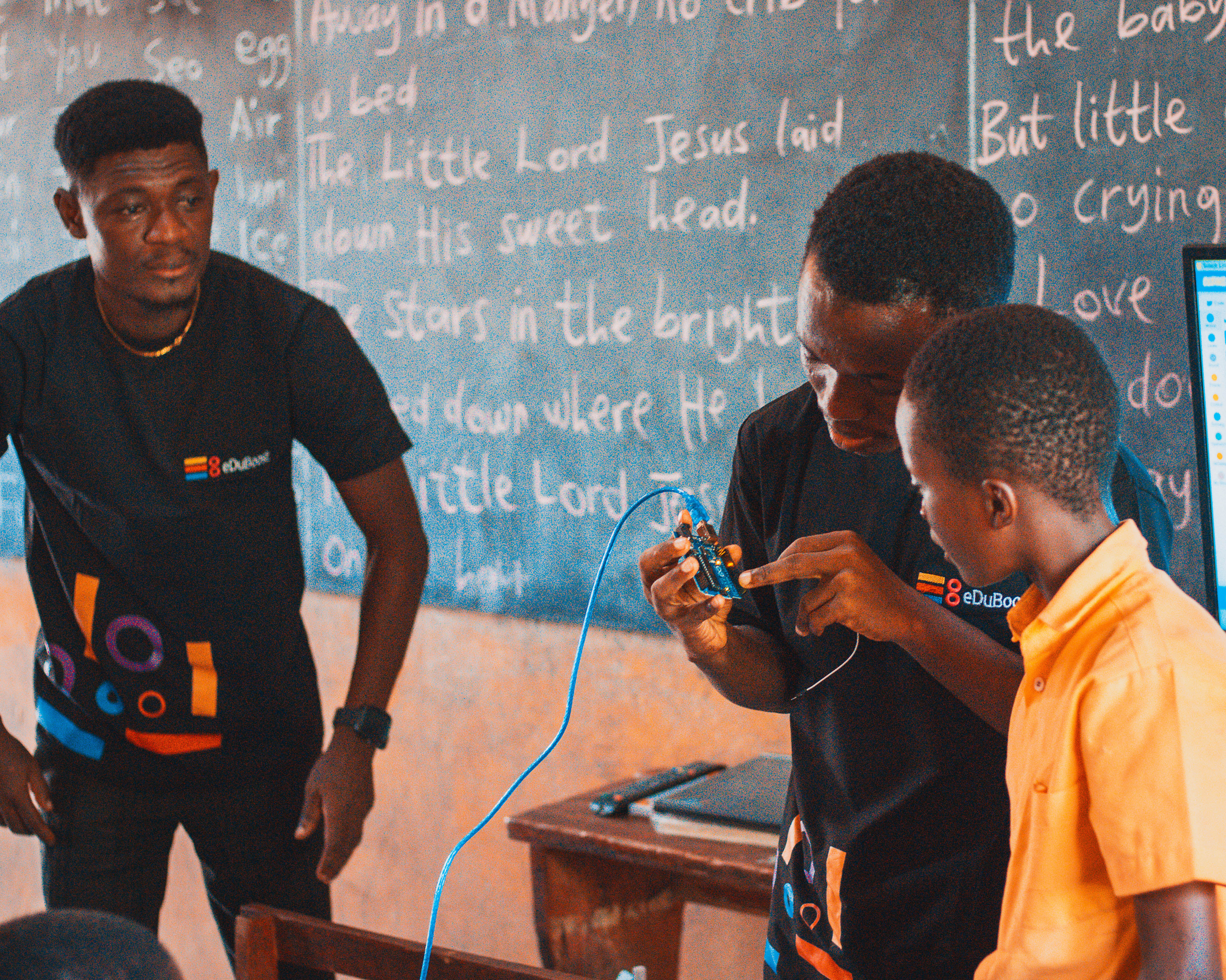 Students participating in an Arduino activity at Anyanui E.P. Basic School