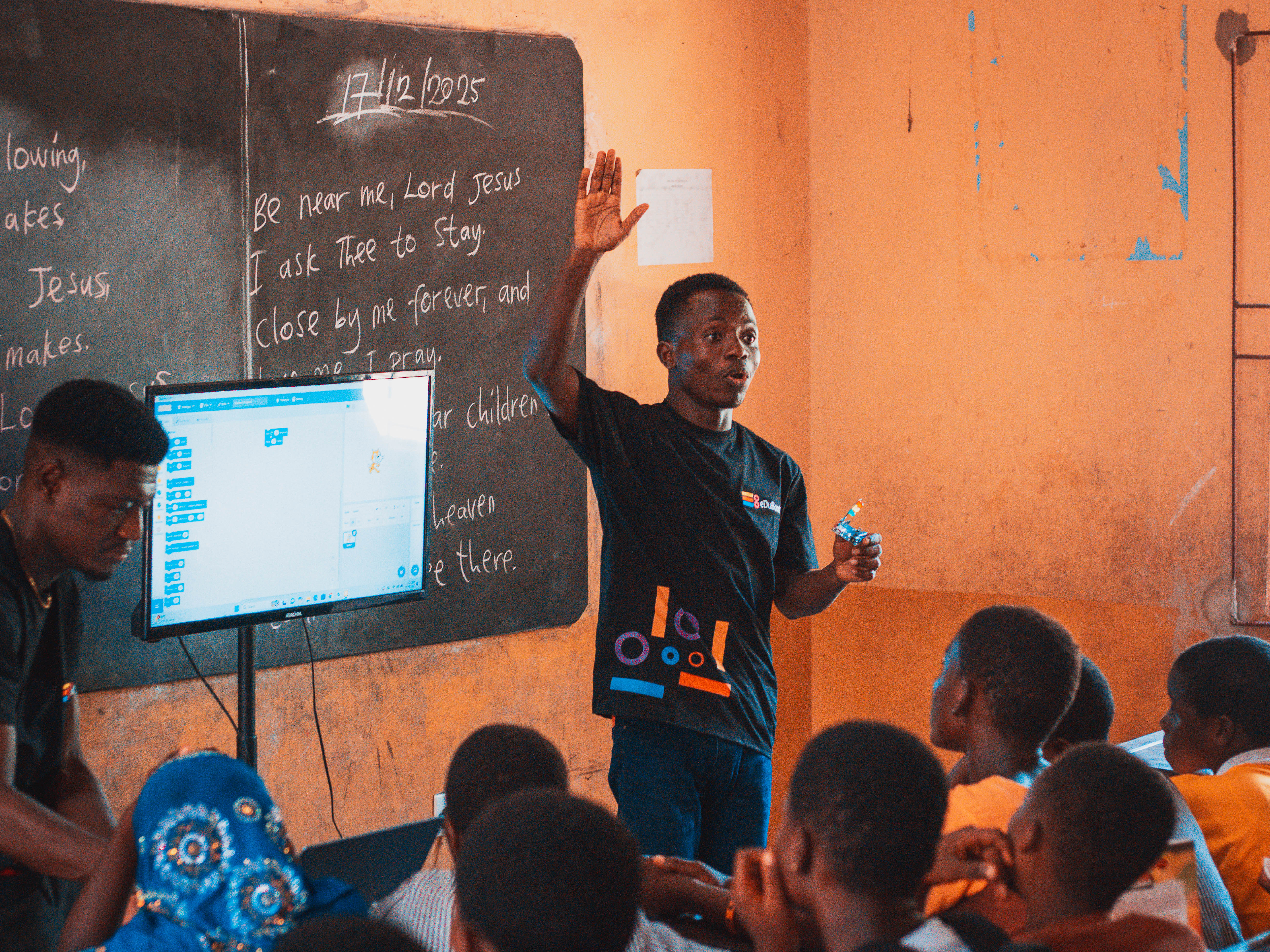 Students learning Scratch programming at Anyanui E.P. Basic School